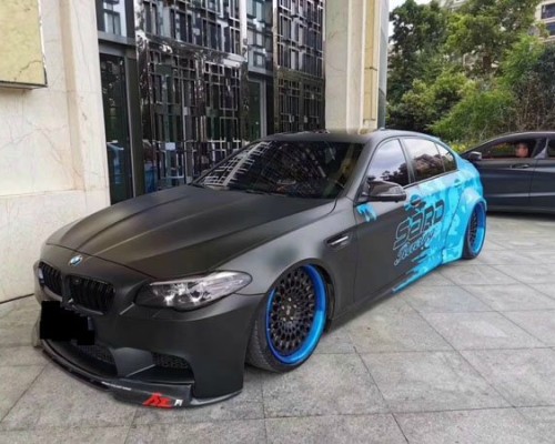Low lying BMW 5 Series F18 stancenation charming posture